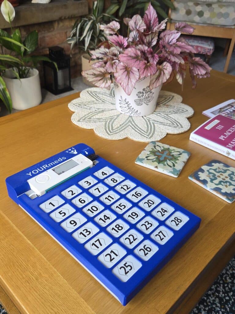 YOURmeds device on table